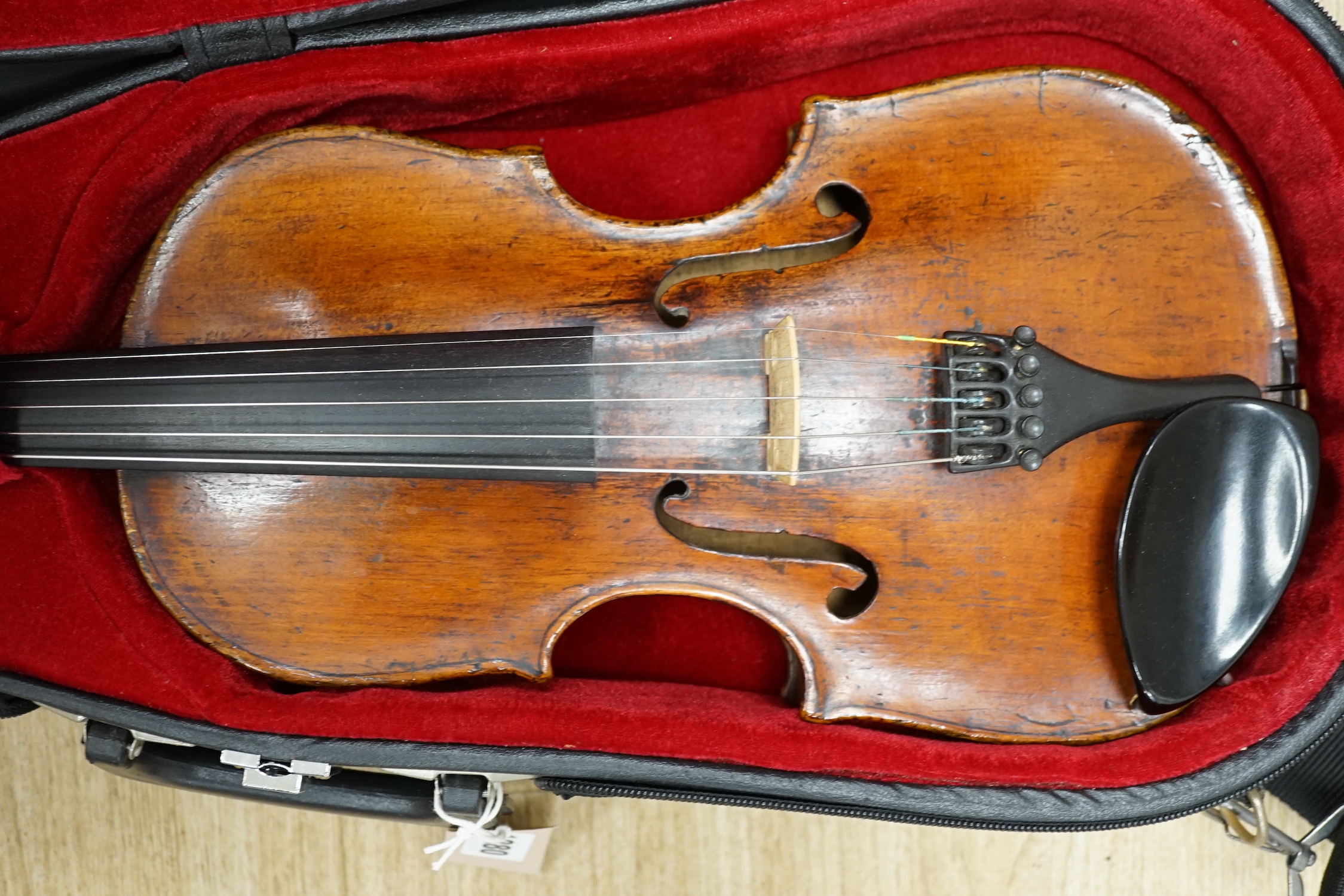 An unusual late 17th century and later cased Quinton (five string violin/viola), with early body with 18th/19th century neck and scroll, tuned for C, G, D, A, E, length of body 36.5cm, without bow